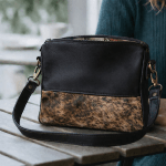 The Chane Sling Bag 2.0 in Black with Nguni base